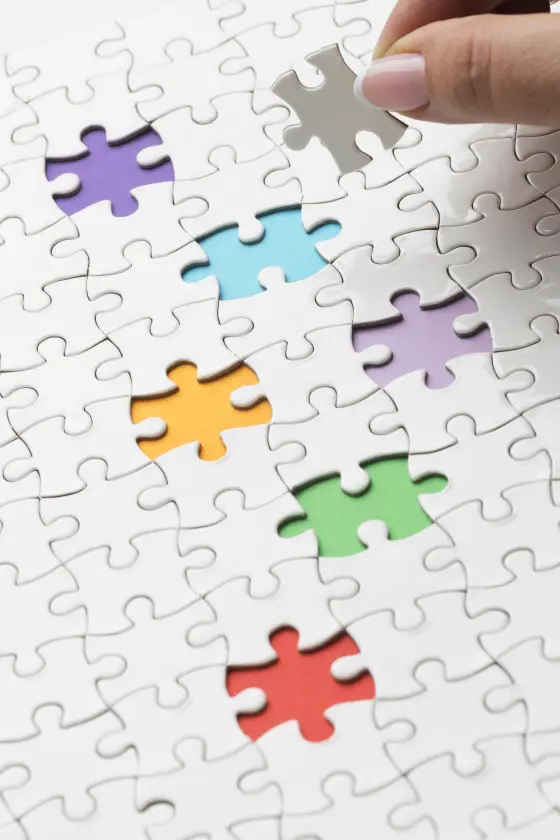 Puzzle pieces coming together into a complete solution